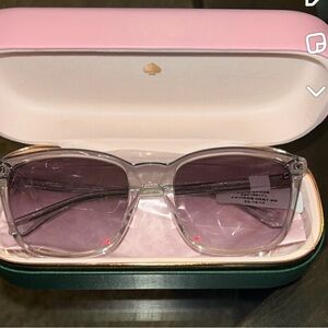 Kate Spade sunglasses never worn with tags! Got as gift not my style.
